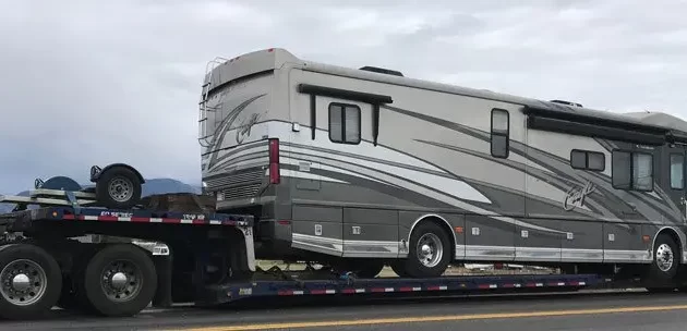 class A RV on transport trailer