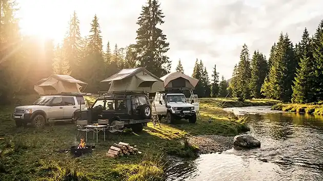 rootop tents setting up for camping