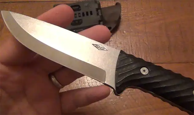 knife and mans hand